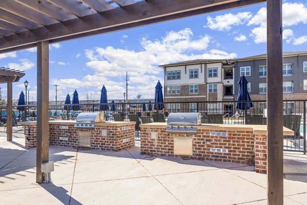 grill area/patio at 101 Depot Apartments