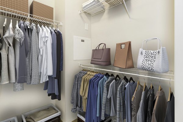 Modern bedroom closet with ample storage at 401 Oberlin Apartments