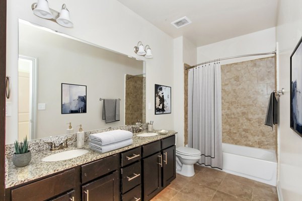 Modern bathroom with sleek fixtures at 401 Oberlin Apartments