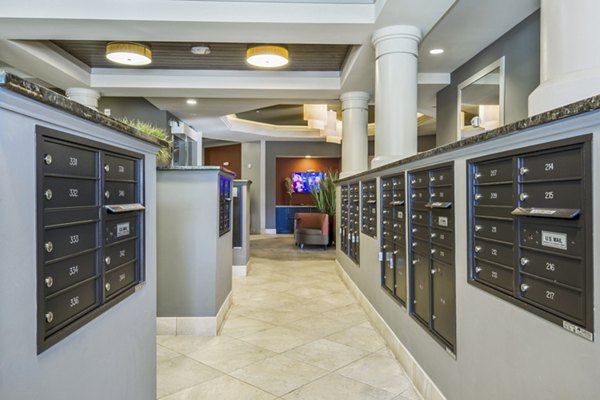 Modern mail room featuring secure parcel lockers at 401 Oberlin Apartments