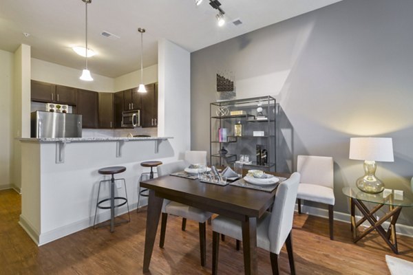 Spacious dining room with modern furnishings at 401 Oberlin Apartments