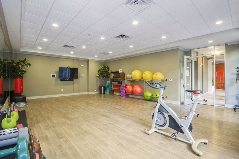 Modern fitness center with state-of-the-art equipment at 401 Oberlin Apartments