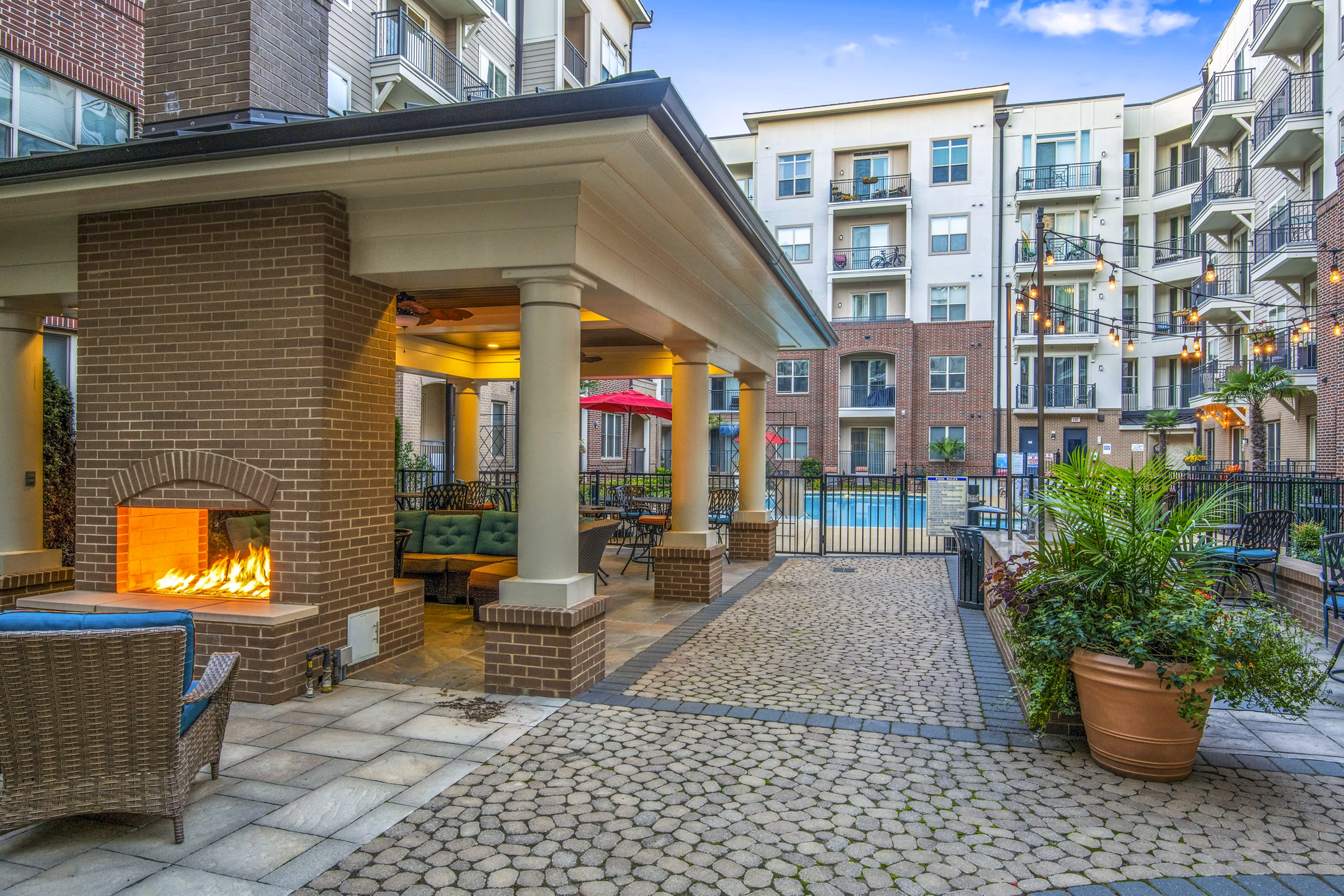 Cozy patio with fire pit at 401 Oberlin Apartments, a luxury Greystar property