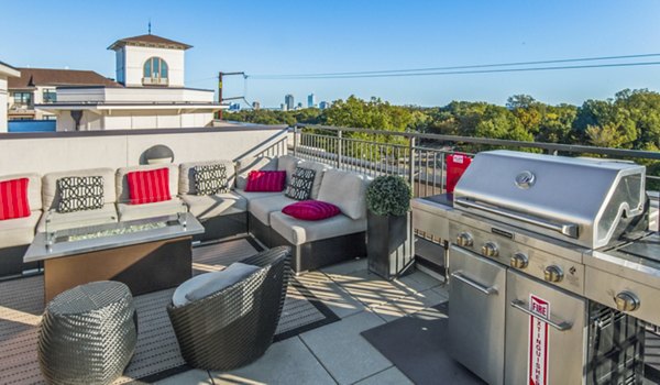 Grill area on stylish patio at 401 Oberlin Apartments, a luxury Greystar property in vibrant downtown Raleigh