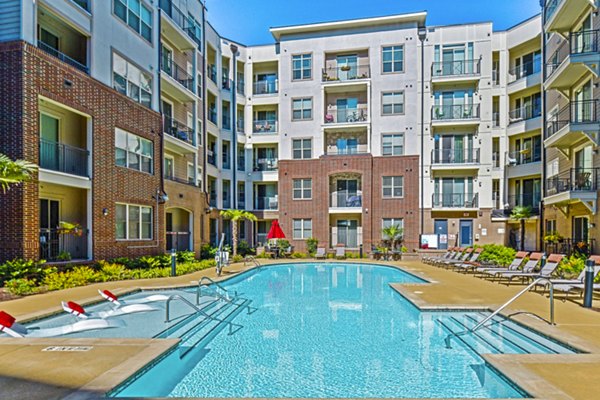 Rooftop pool with city views at 401 Oberlin Apartments