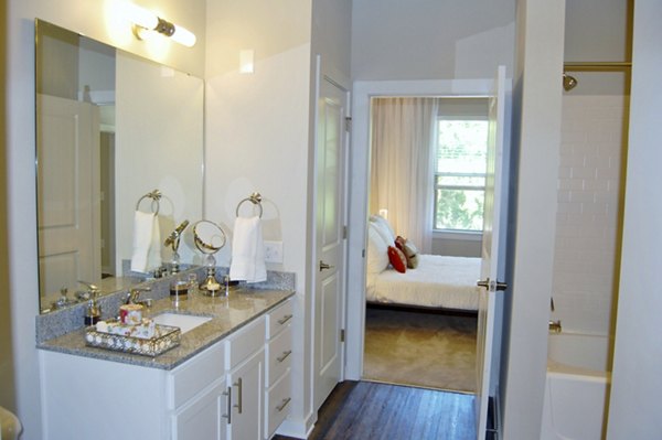 Luxury bathroom with modern fixtures at 5115 Park Place Apartments