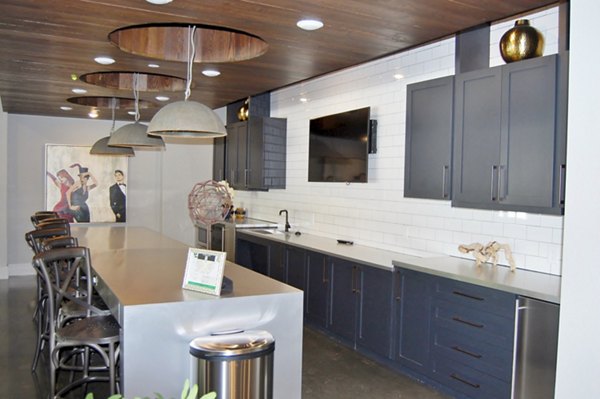Contemporary clubhouse with luxurious seating areas at 5115 Park Place Apartments
