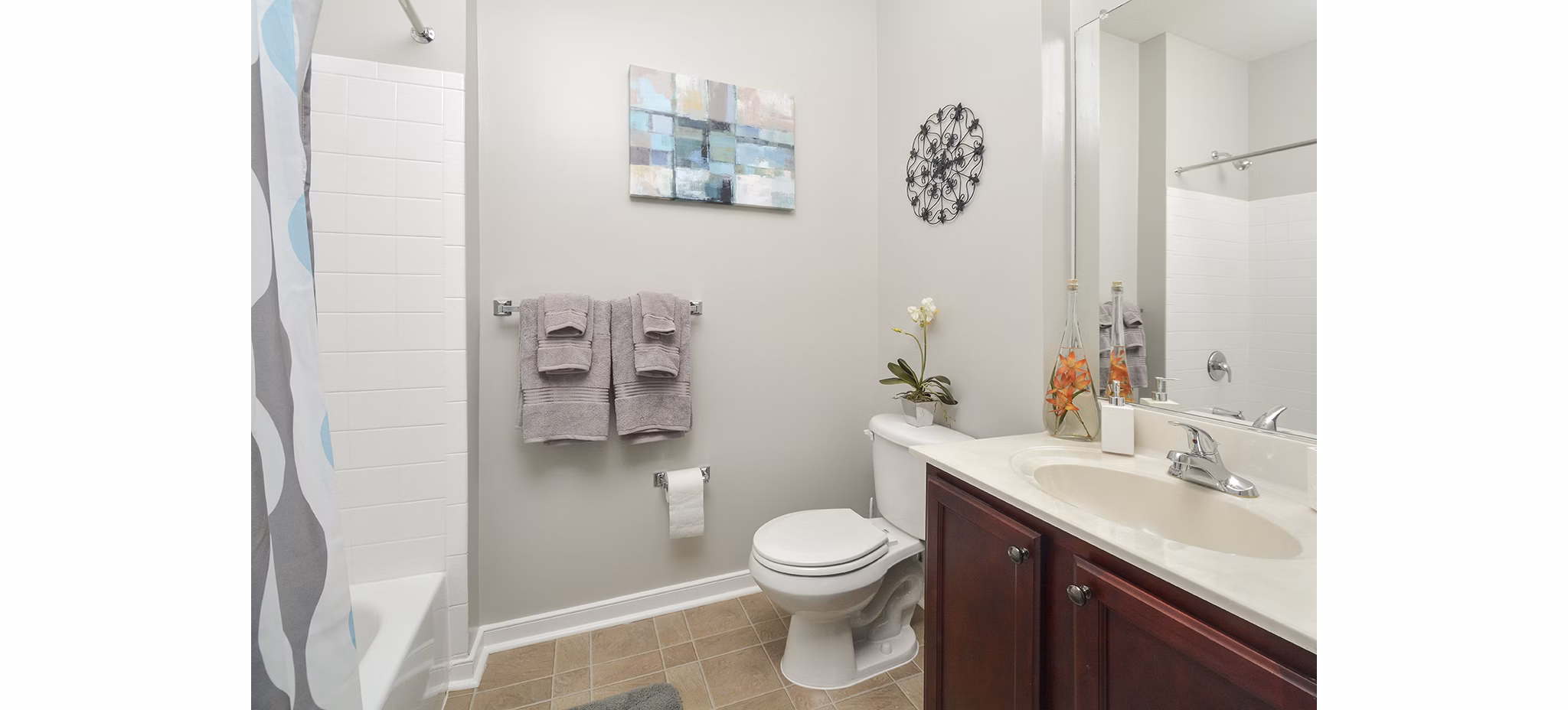 Luxurious bathroom with modern fixtures at 62 Eleven Apartments - stylish and functional living spaces in the heart of the city