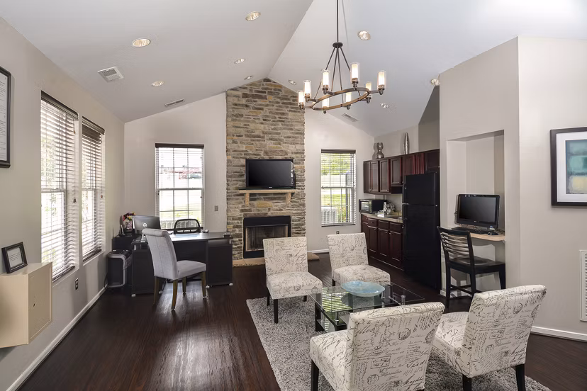 Clubhouse with modern design and cozy seating at 62 Eleven Apartments