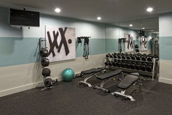 Fitness center with modern equipment at 62 Eleven Apartments for luxury living