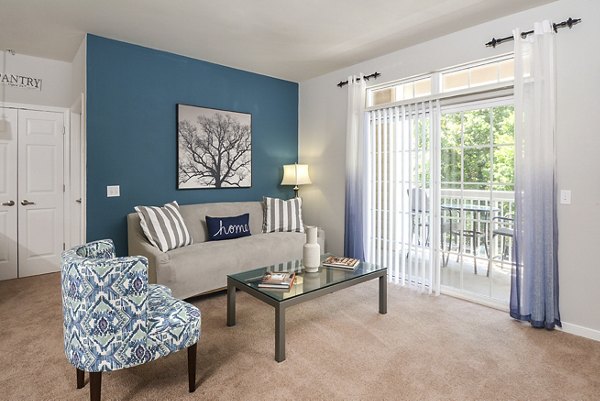 Cozy living room with modern decor in 62 Eleven Apartments