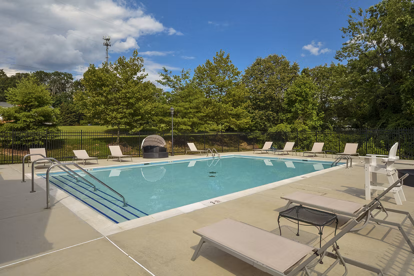 Scenic rooftop pool with city views at 62 Eleven Apartments offering luxury living amenities