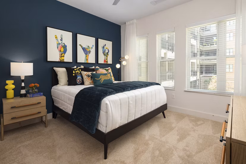 Modern bedroom with elegant decor at 675 N Highland Apartments in downtown Atlanta
