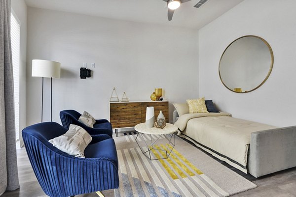 Modern bedroom with elegant decor at 675 N Highland Apartments in downtown Atlanta