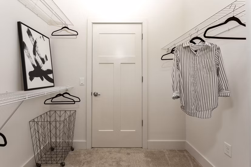 Cozy bedroom with stylish decor at 675 N Highland Apartments, offering luxury living spaces