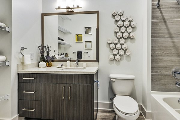 Modern bathroom with sleek fixtures at 675 N Highland Apartments