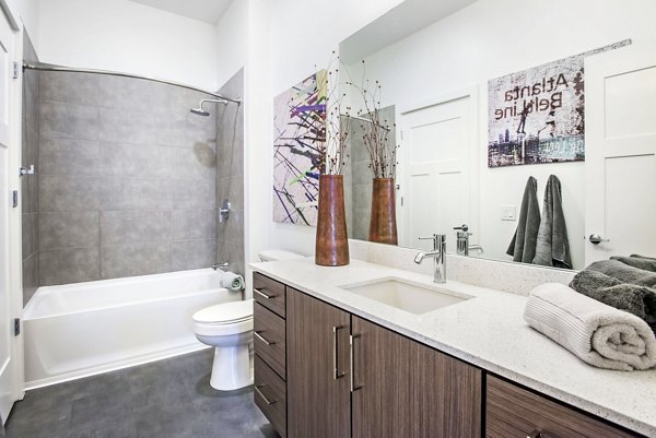 Bathroom showcasing sleek fixtures and modern design at 675 N Highland Apartments