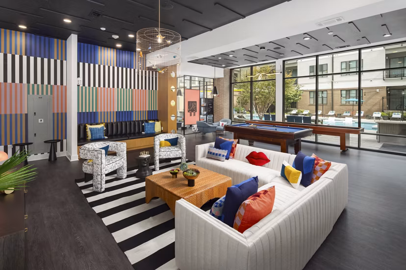 Clubhouse with modern furnishings at 675 N Highland Apartments offering luxury living spaces in Atlanta, GA.