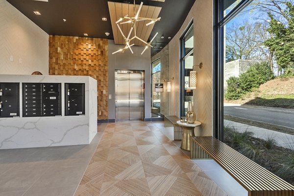 Clubhouse with modern furnishings at 675 N Highland Apartments offering luxury living spaces in Atlanta, GA.
