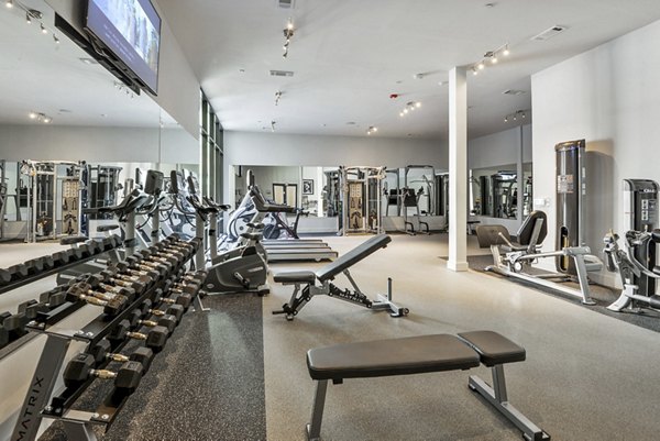 State-of-the-art fitness center at 675 N Highland Apartments featuring modern equipment and spacious workout areas