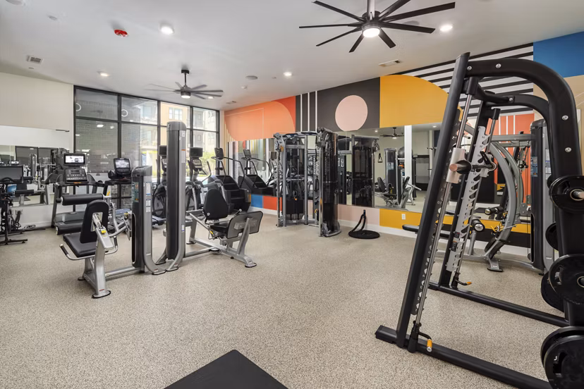 Fitness center with modern equipment at 675 N Highland Apartments, luxury living by Greystar in prime urban location