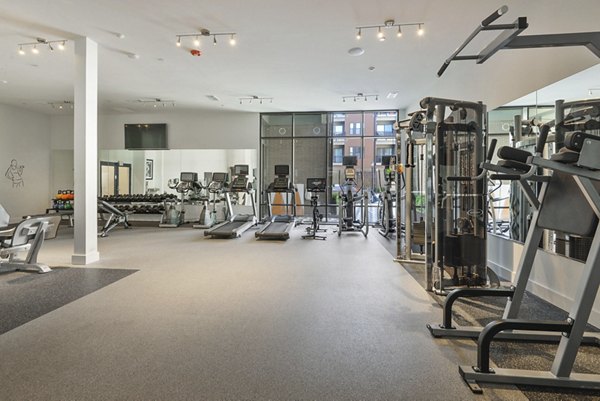 Fitness center with modern equipment at 675 N Highland Apartments, luxury living by Greystar in prime urban location