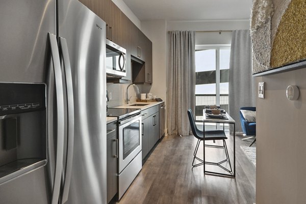 Kitchen at 675 N Highland Apartments