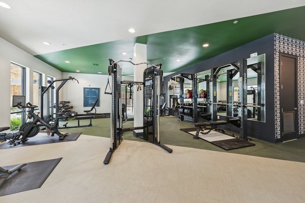 fitness center at The Albright Apartments 