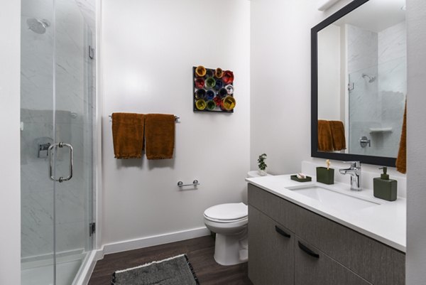 Bathroom with modern fixtures at Alta 801 Apartments, offering luxury apartment living