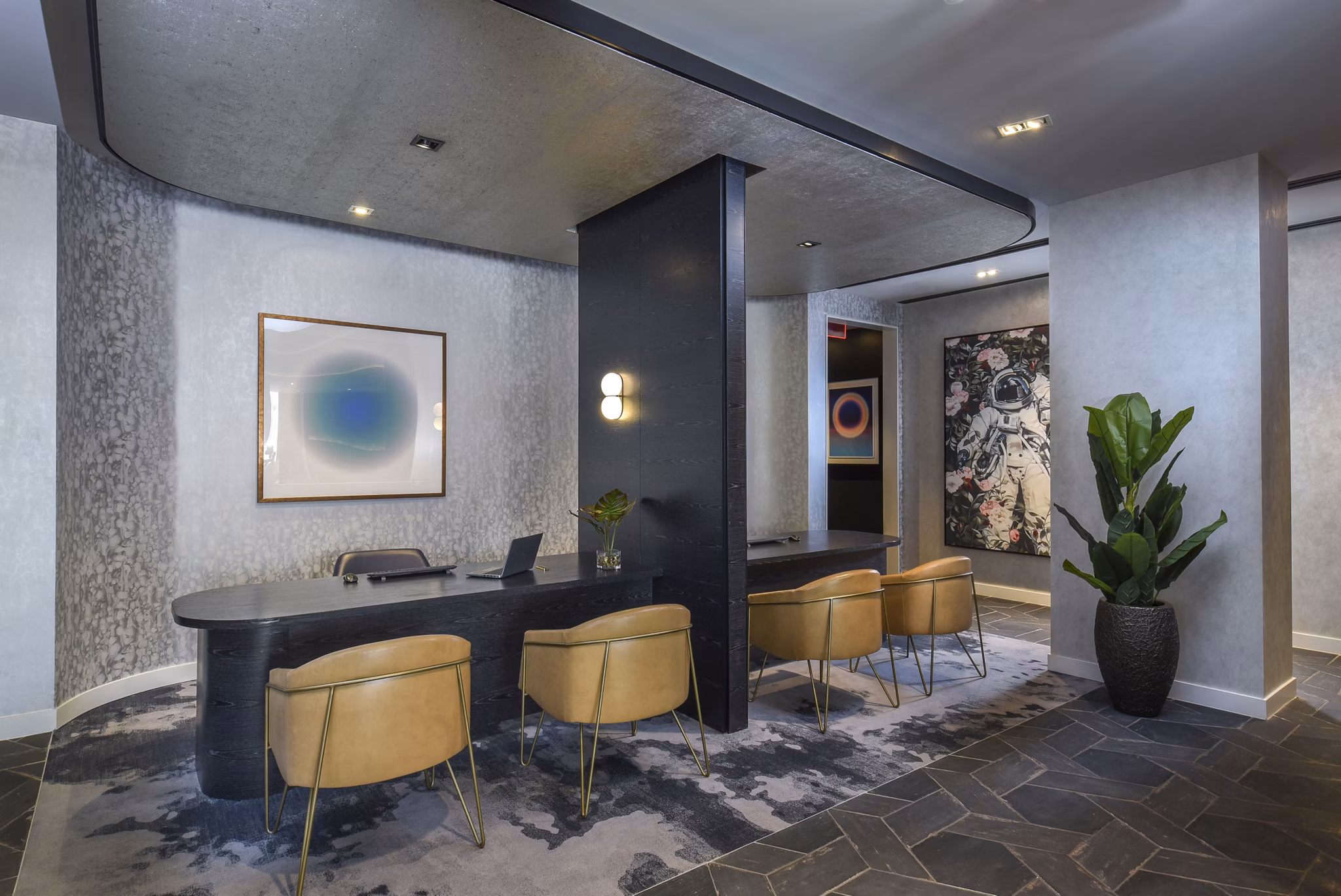 Clubhouse with modern design at Alta 801 Apartments, featuring luxury lounging areas and stylish decor in urban setting