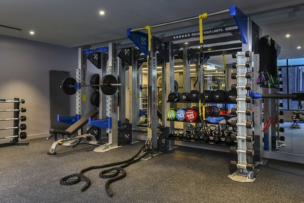 State-of-the-art fitness center featuring modern equipment at Alta 801 Apartments