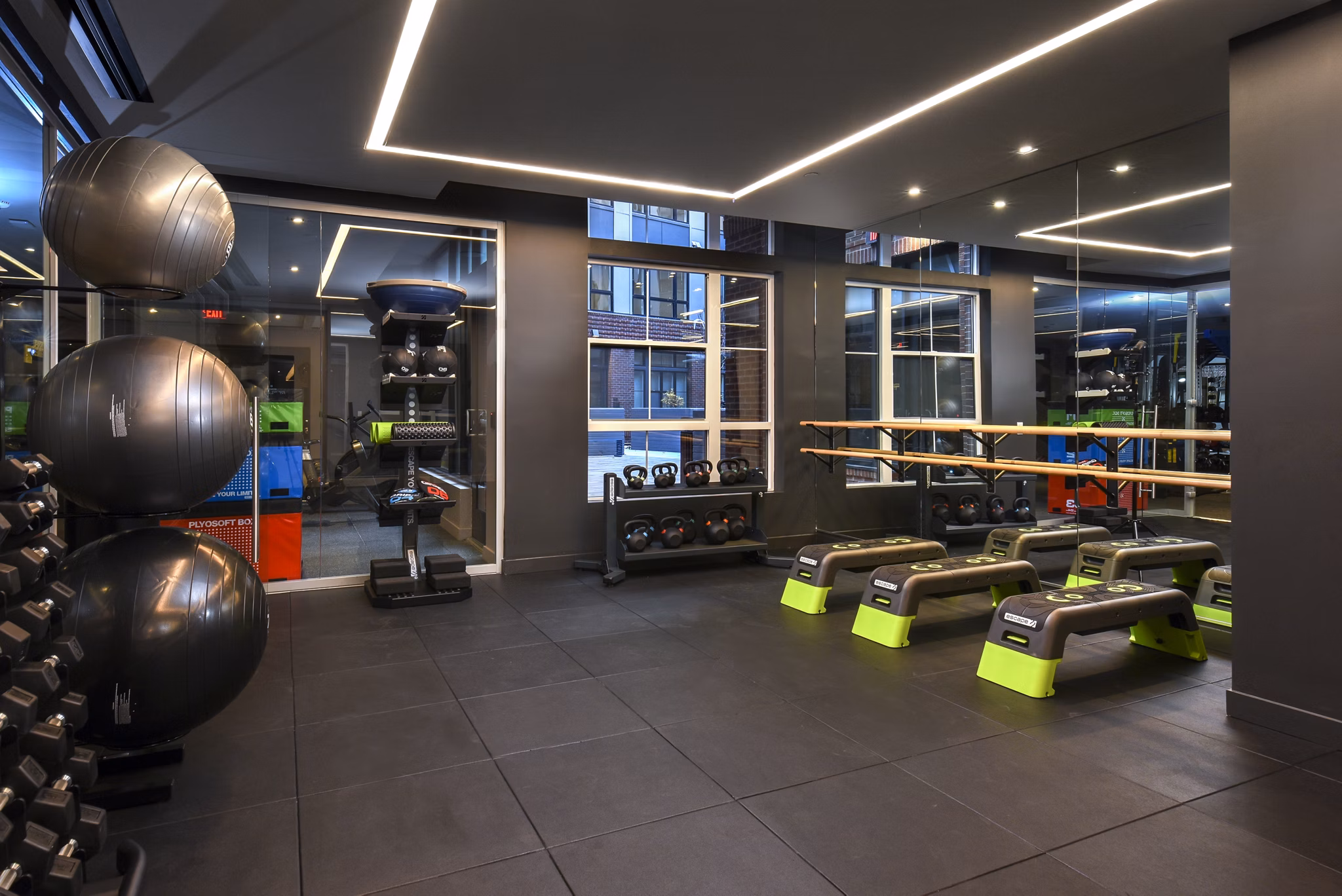 State-of-the-art fitness center at Alta 801 Apartments featuring modern gym equipment and workout space