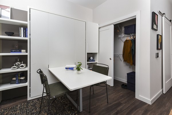 Modern kitchen with stainless steel appliances at Alta 801 Apartments