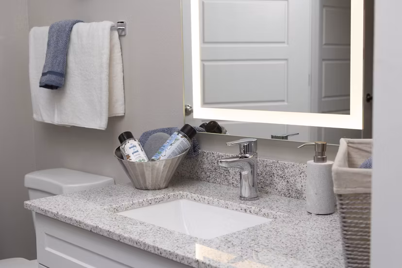 Modern bathroom with sleek fixtures at Alta 99th Ave Apartments