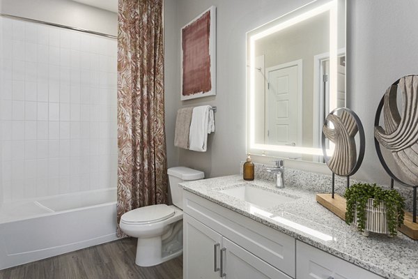 Bathroom with modern fixtures at Alta 99th Ave Apartments