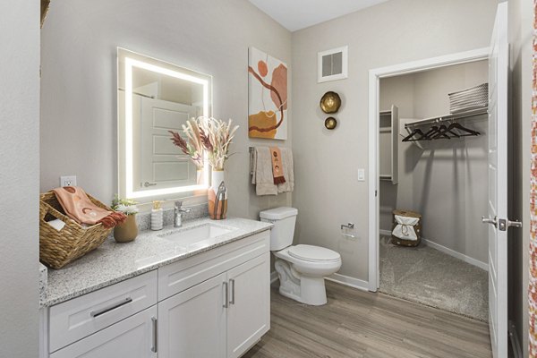 Modern bathroom with sleek fixtures at Alta 99th Ave Apartments