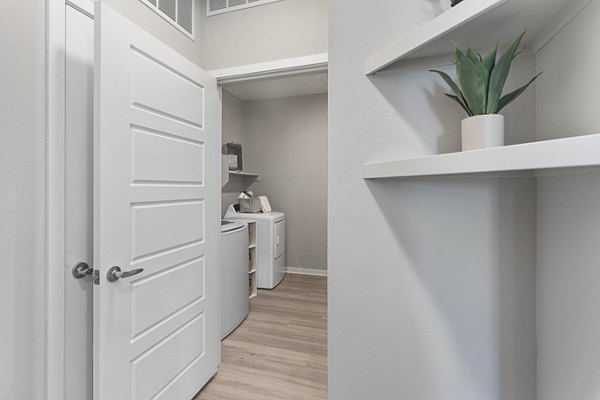 Modern hallway with elegant lighting in Alta 99th Ave Apartments offering luxury living spaces