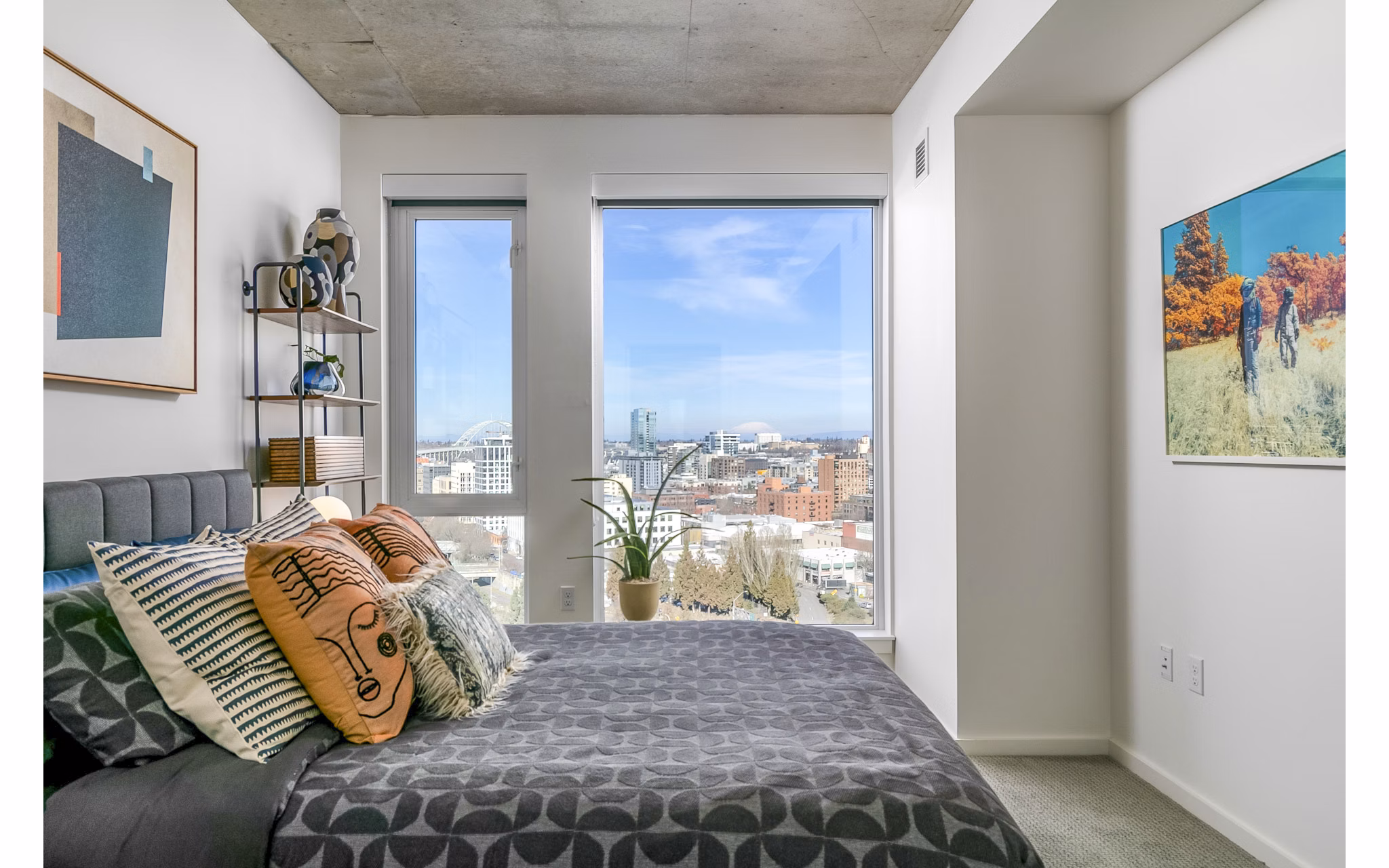 Elegant bedroom with modern decor at Alta ART Tower Apartments