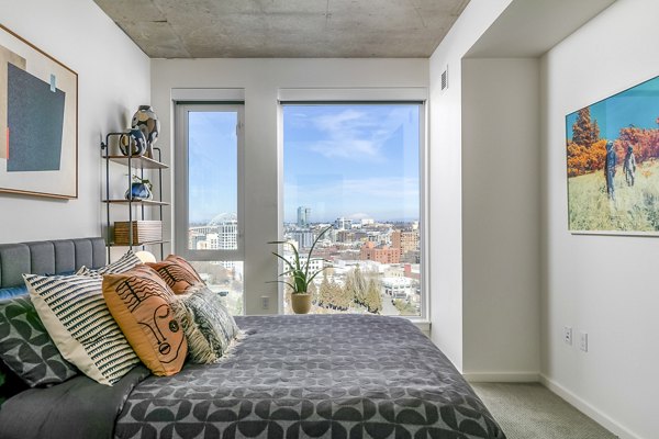 Elegant bedroom with modern decor at Alta ART Tower Apartments