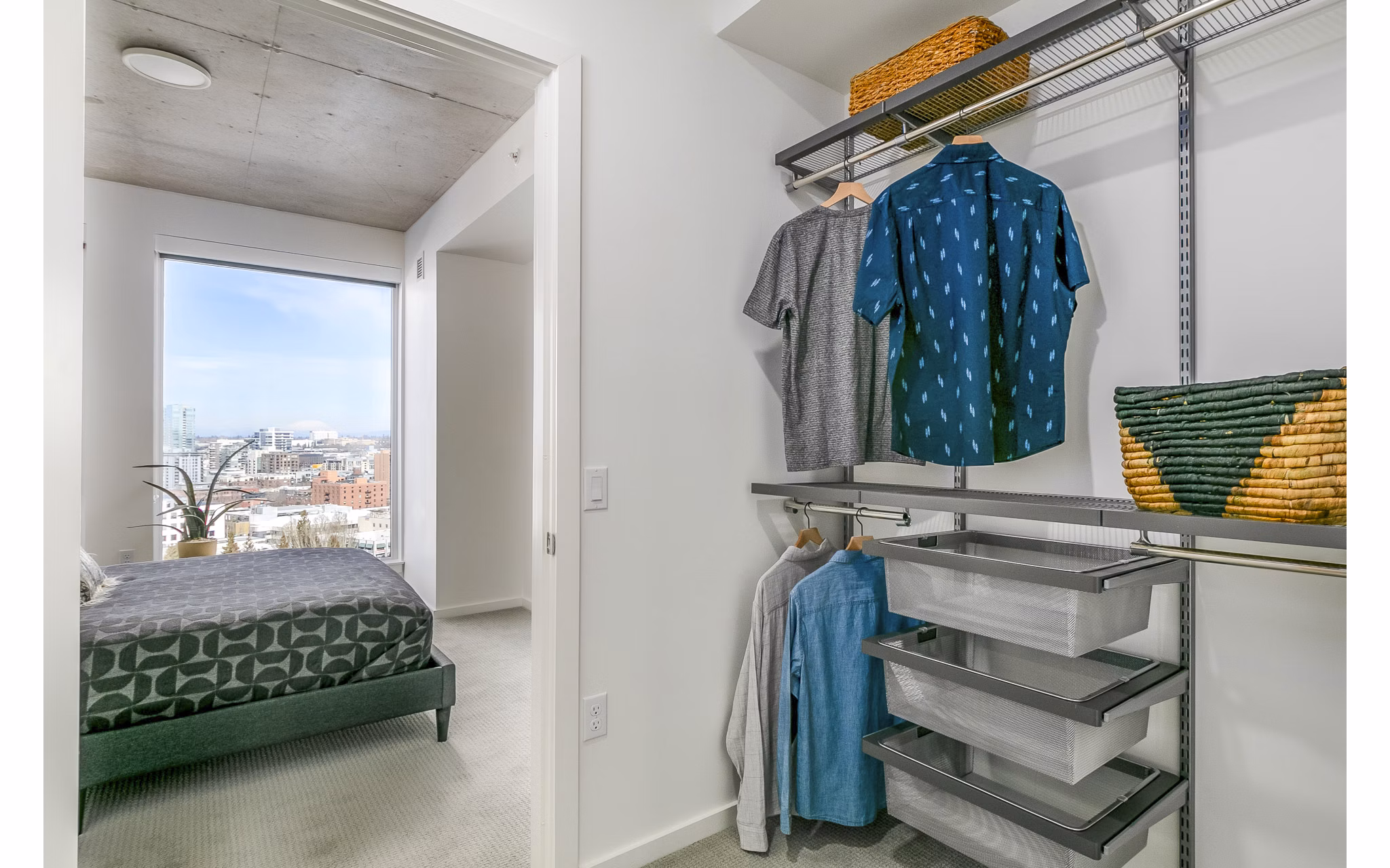 Spacious bedroom closet with customizable shelving in Alta ART Tower Apartments, luxury high-rise living near cultural hotspots