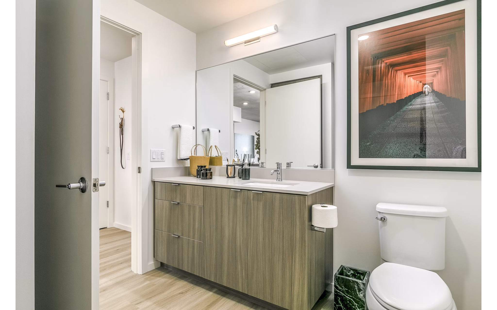 Modern bathroom with white countertops and sleek fixtures in Alta ART Tower Apartments