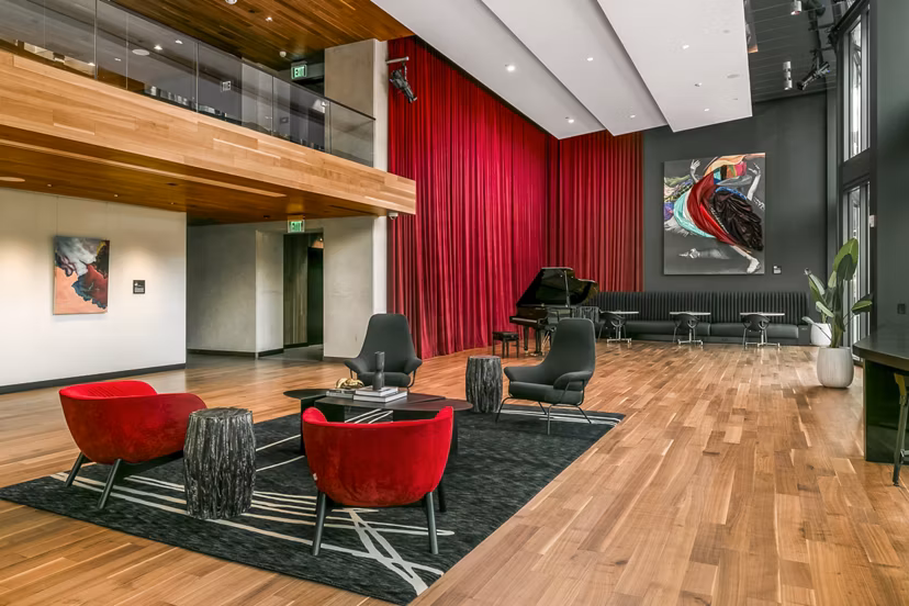 Clubhouse lobby with modern decor at Alta ART Tower Apartments, luxury Greystar property offering premium amenities and stylish urban living