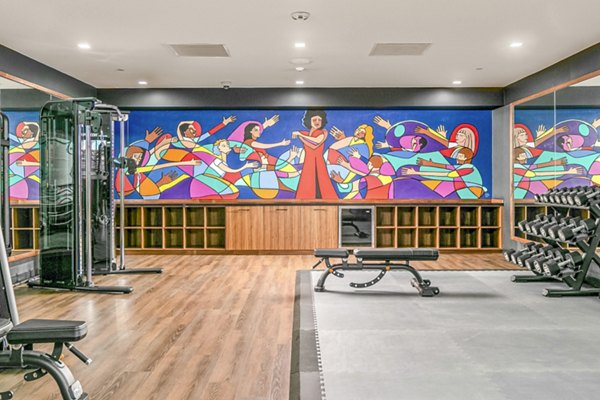 Well-equipped fitness center at Alta ART Tower Apartments with modern equipment for active lifestyles