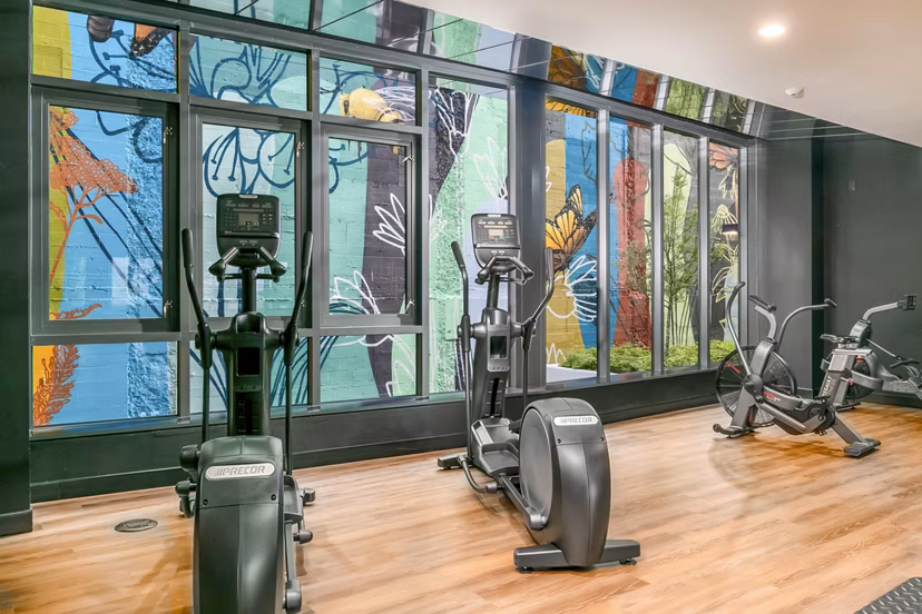State-of-the-art fitness center at Alta ART Tower Apartments with modern equipment for an enhanced workout experience