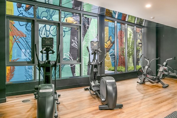 State-of-the-art fitness center at Alta ART Tower Apartments with modern equipment for an enhanced workout experience