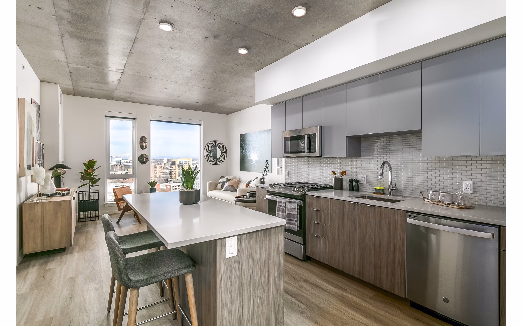 Modern kitchen with stainless steel appliances at Alta ART Tower Apartments