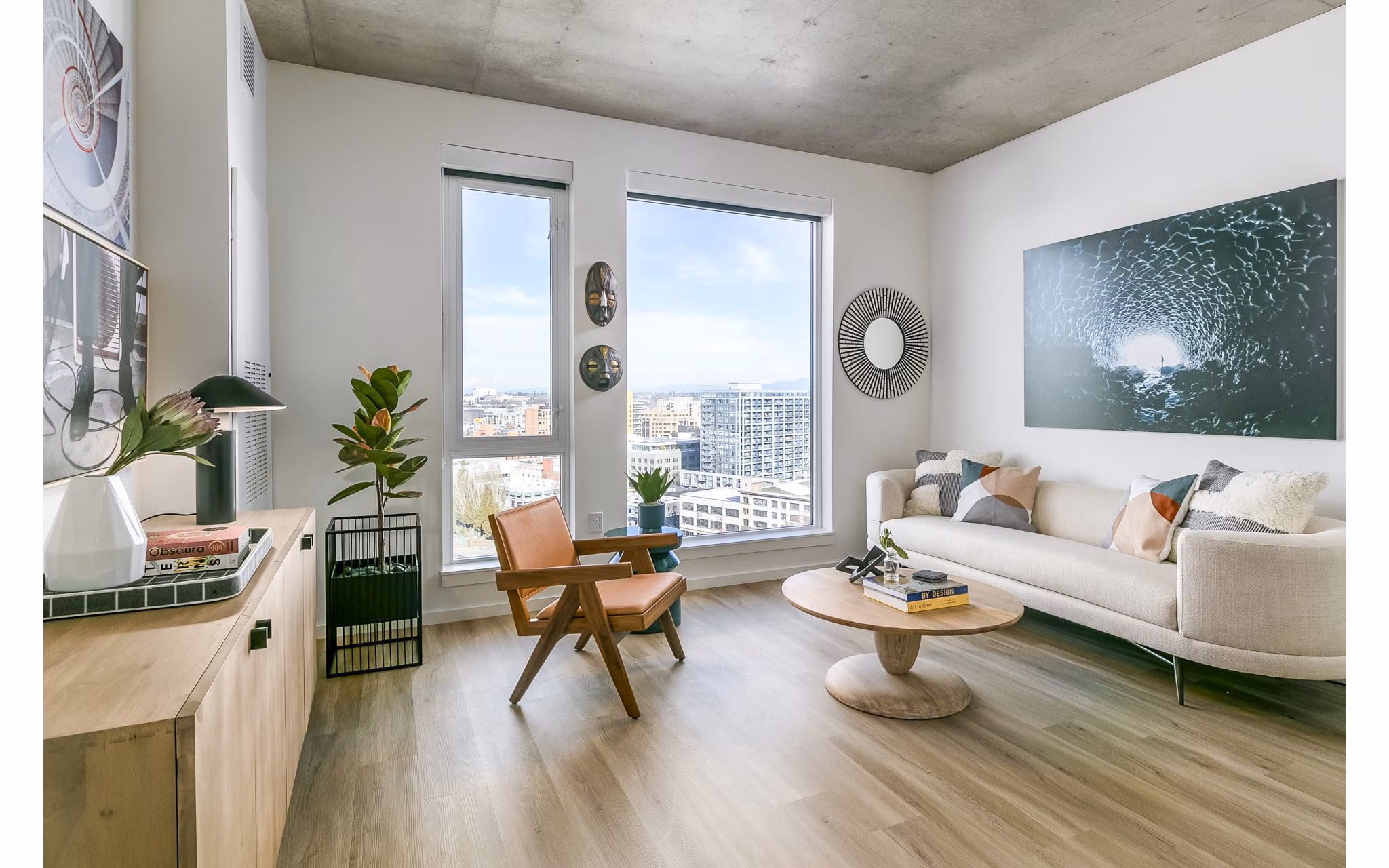 Spacious living room with modern decor at Alta ART Tower Apartments