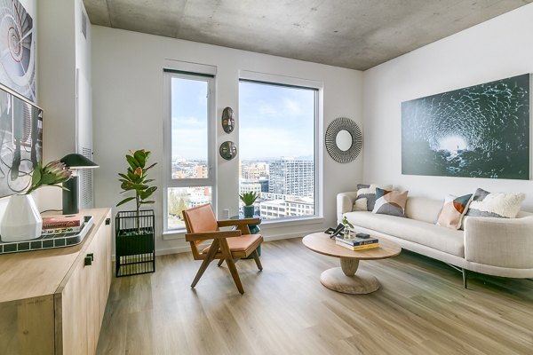 Spacious living room with modern decor at Alta ART Tower Apartments
