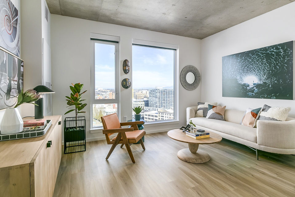 Spacious living room with modern decor at Alta ART Tower Apartments