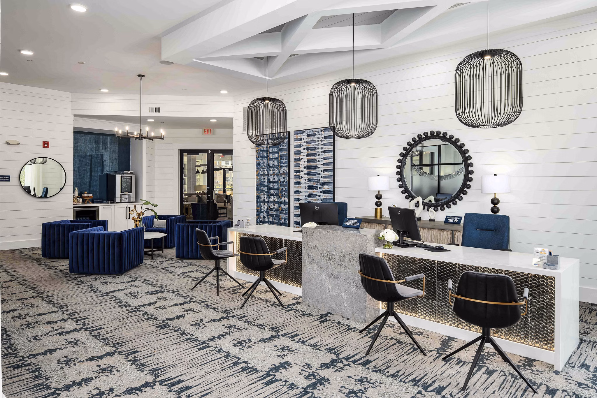 Clubhouse featuring modern design and spacious seating at Alta Ashley Park Apartments